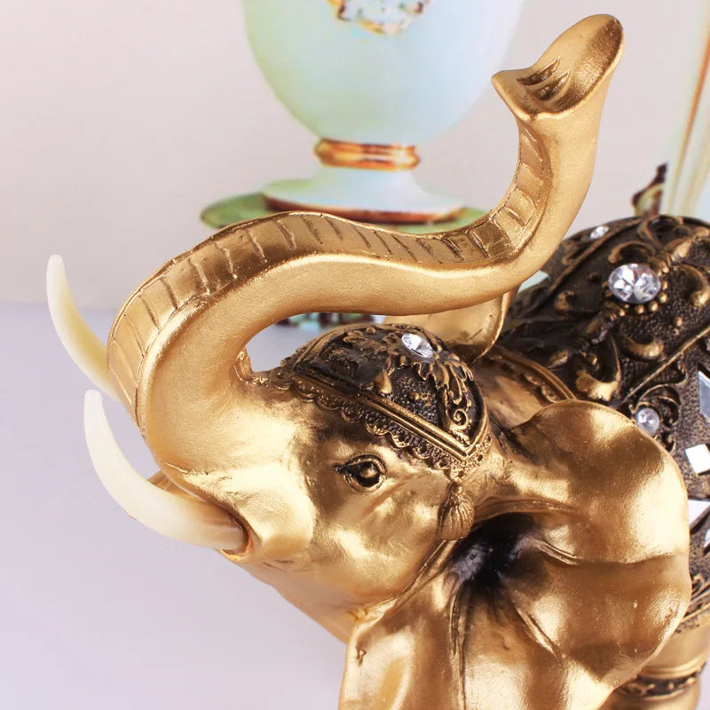 statuette-elephant-resine-dore-Fen-Shui-chance-prosperite-cadeau-trompe