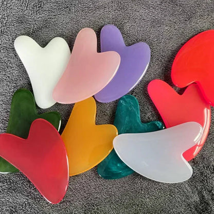 Gua-Sha-facial-stone-cire-d'abeille-massage-visage-cernes-relaxation-multicolore