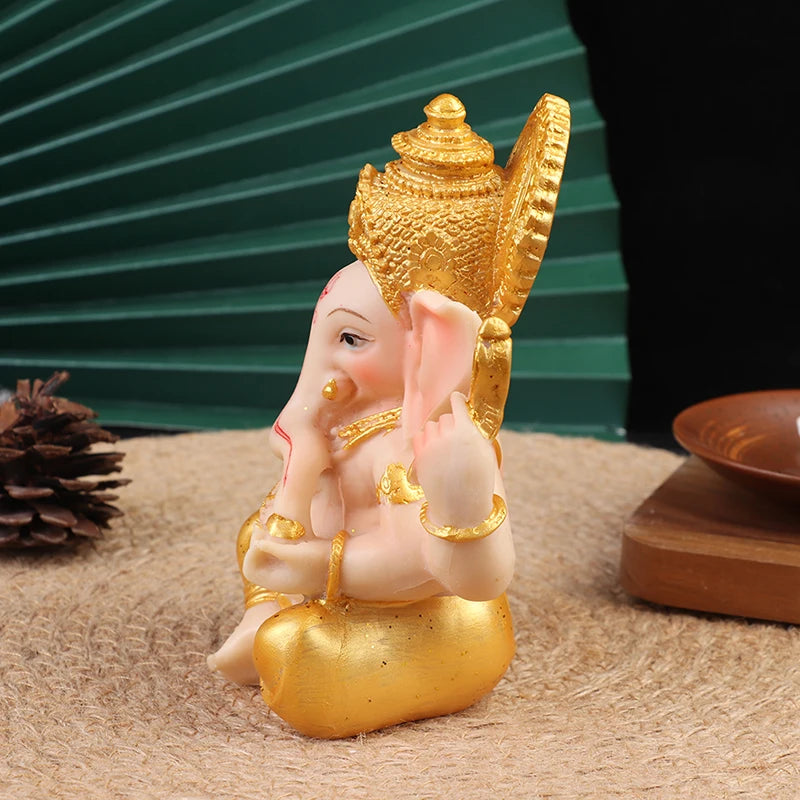 Statuette-bouddha-seigneur-ganesh -dieu-elephant-rose