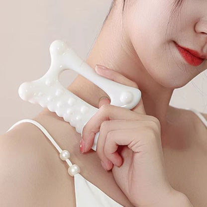 gua-sha-visage-planche-massage-blanc-corps
